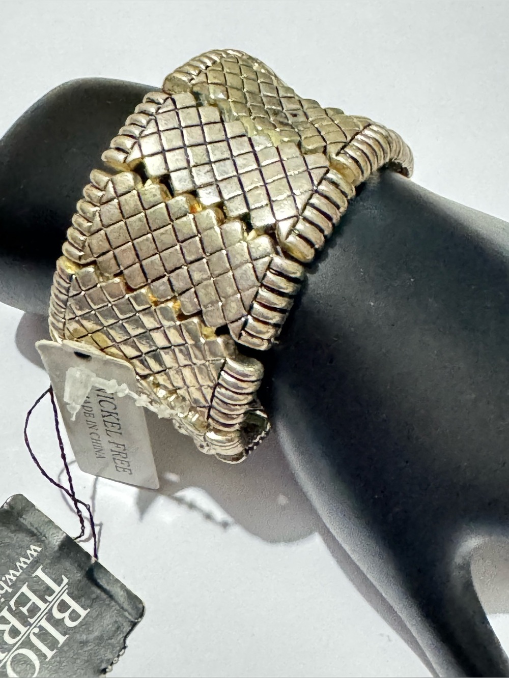 Bijoux Terner brand stretch bracelet silver-toned, basket-design